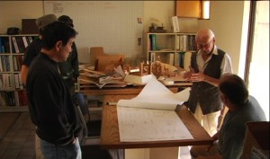 Paolo Soleri discussing the plans.