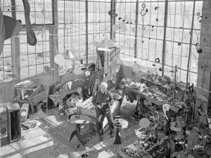 Alexander Calder in his studio