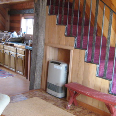 Kitchen and stairs to the loft.