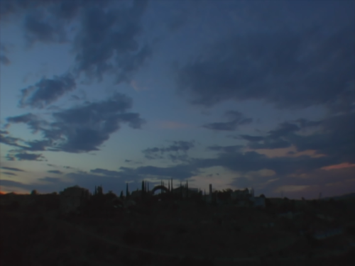 Screenshot from the documentary A Life's Work, of Arcosanti at dusk.
